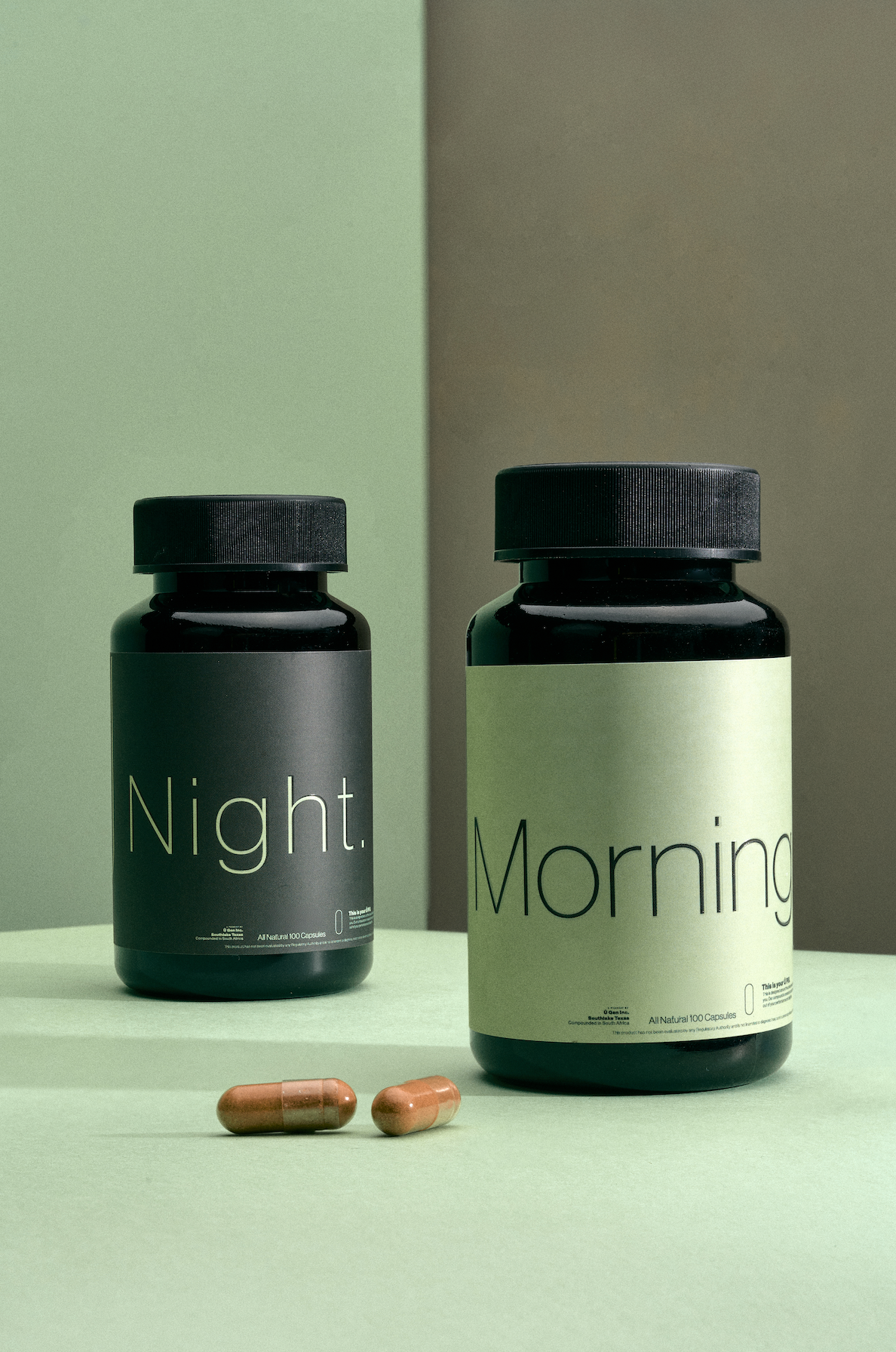 Two supplement bottles labeled 'Night' and 'Morning' on a light green surface with a neutral background.