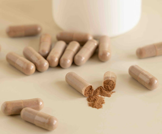 A photo of natural supplement capsules designed to use adaptogens to help provide natural stress relief.