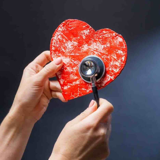 A photo of a heart being checked out for American Heart Month.