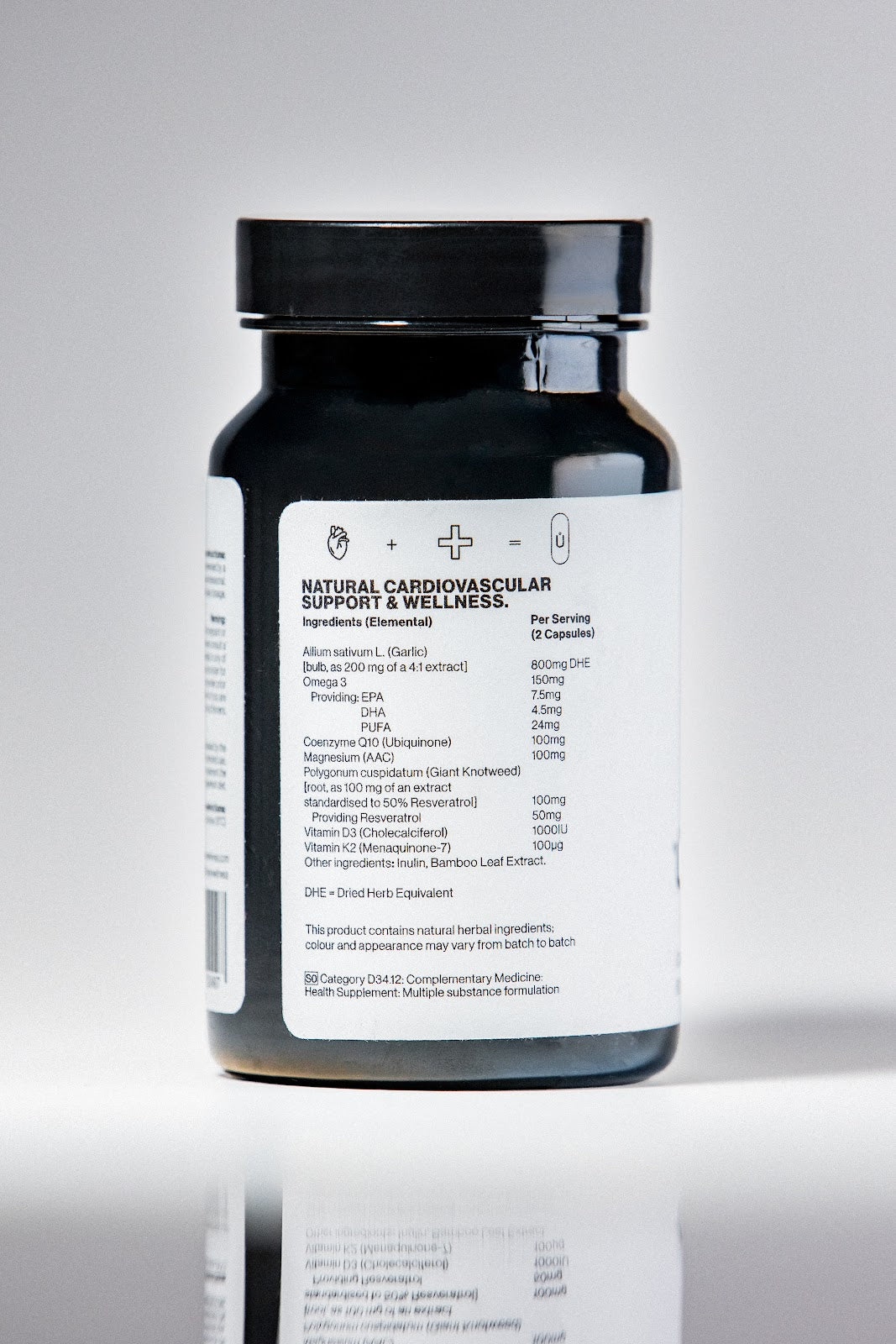 Ů HEART supplement bottle with ingredient panel, plant-based capsules for a daily wellness routine.